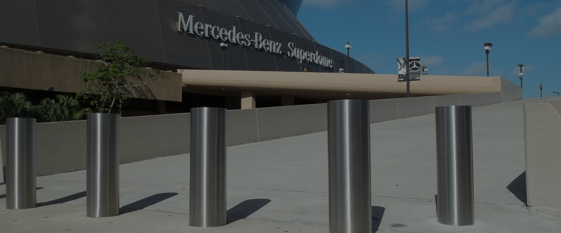bollards in front of Mercedes Benz Superdome