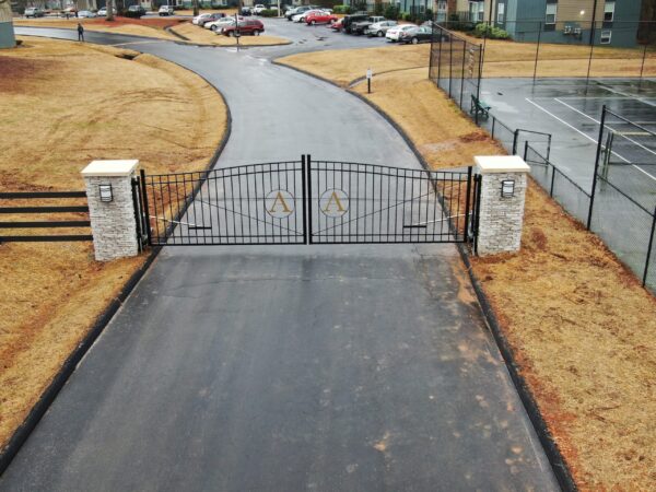 Closed Security Gate In Front Of Residential Apartments