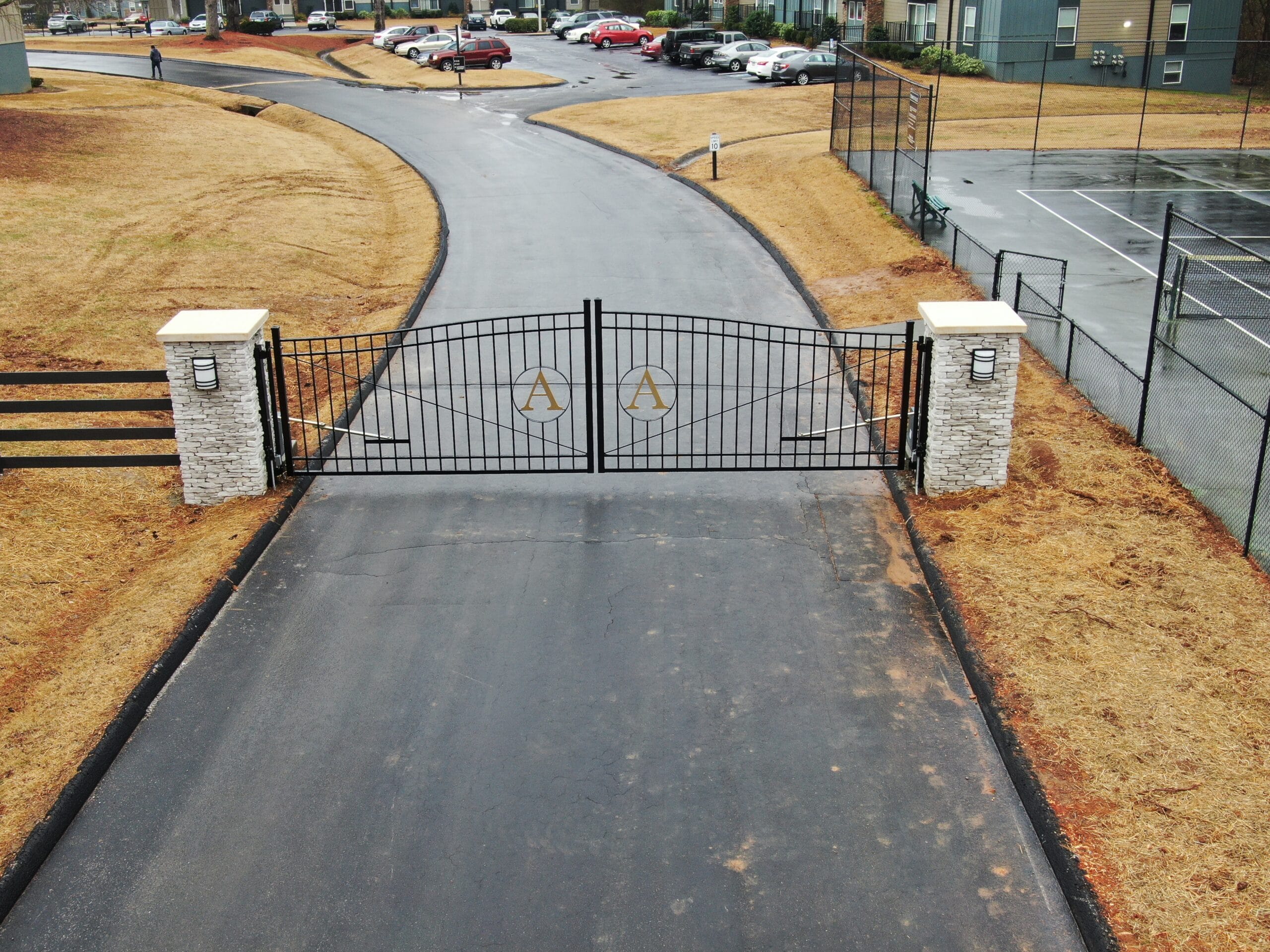 closed security gate in front of residential apartments